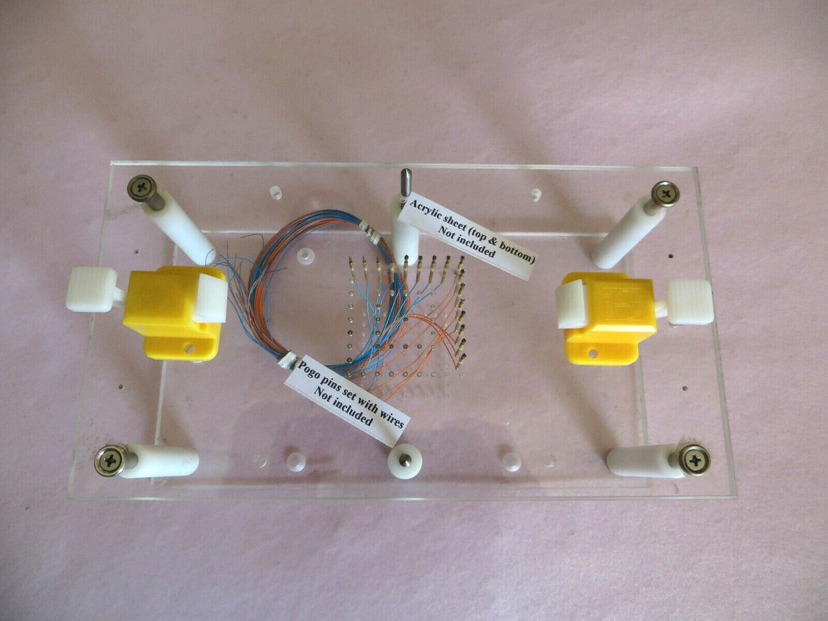 Fixture de pruebas con placas transparentes y pogo pins de referencia